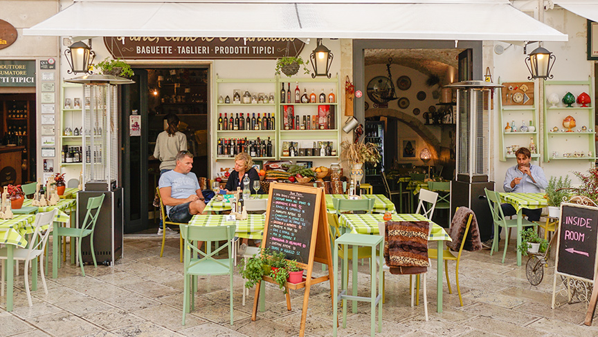 Watching the world go by. Puglia Bar